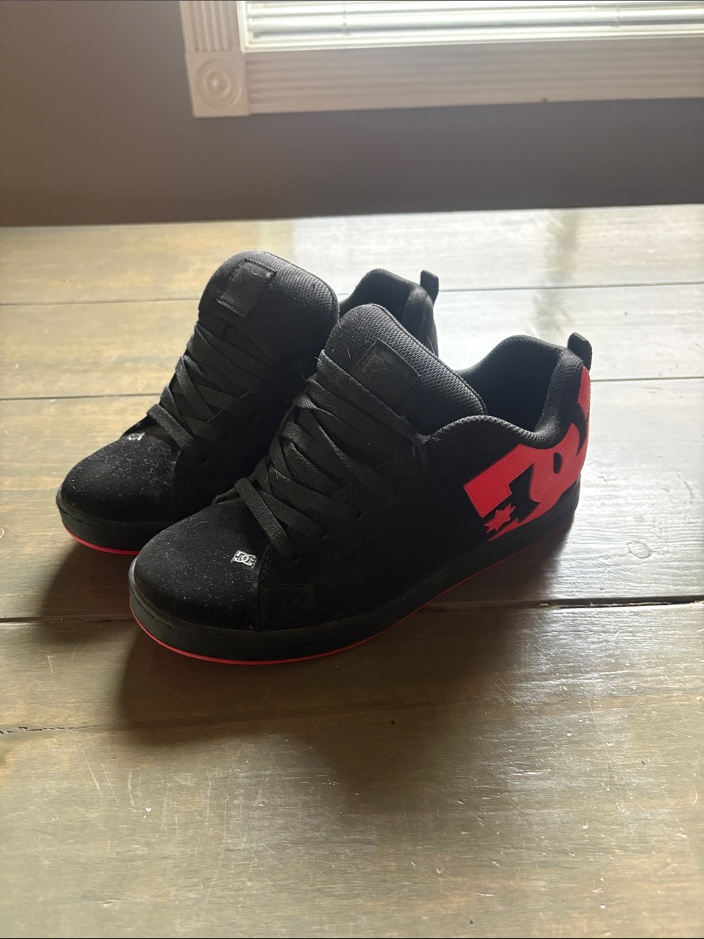 DC Women’s Black Sneakers with Pink Logo Accents
